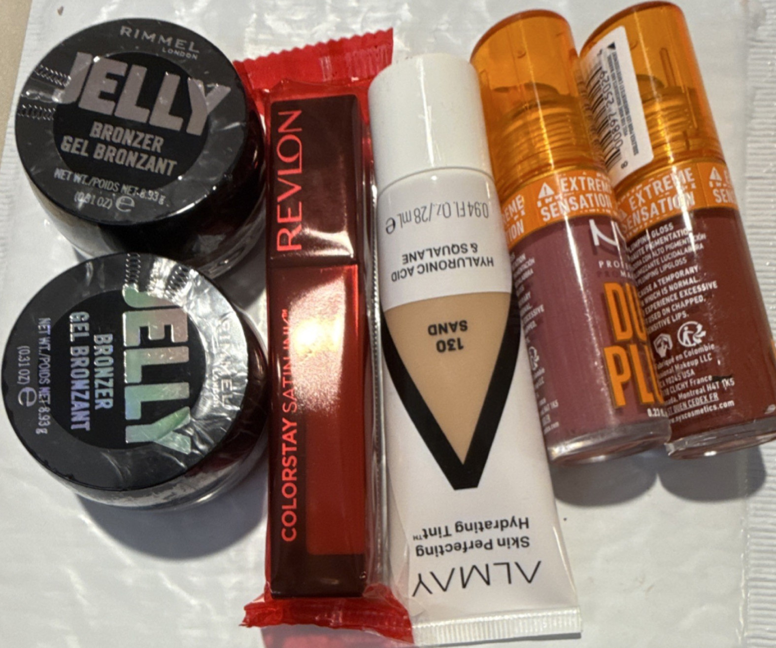 Rimmel Jelly Bronzer 002, Revlon Satin Ink, Almay Tint 130, NYX Duck Plump, Ful…