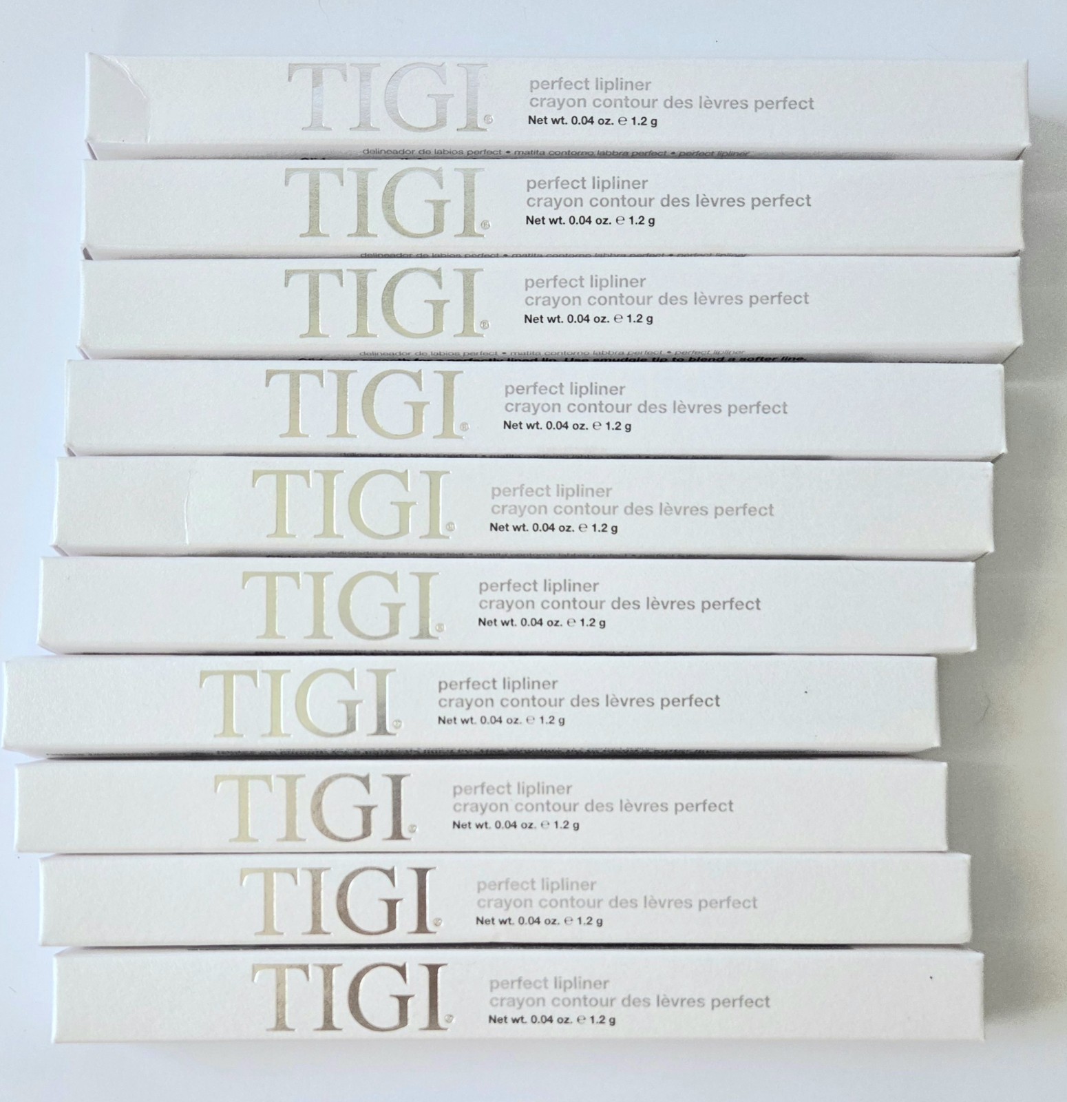 LOT OF 85 TIGI COSMETICS, LIPSTICK, LIPLINER, BLUSH, EYESHADOW, BRUSHES, NIB