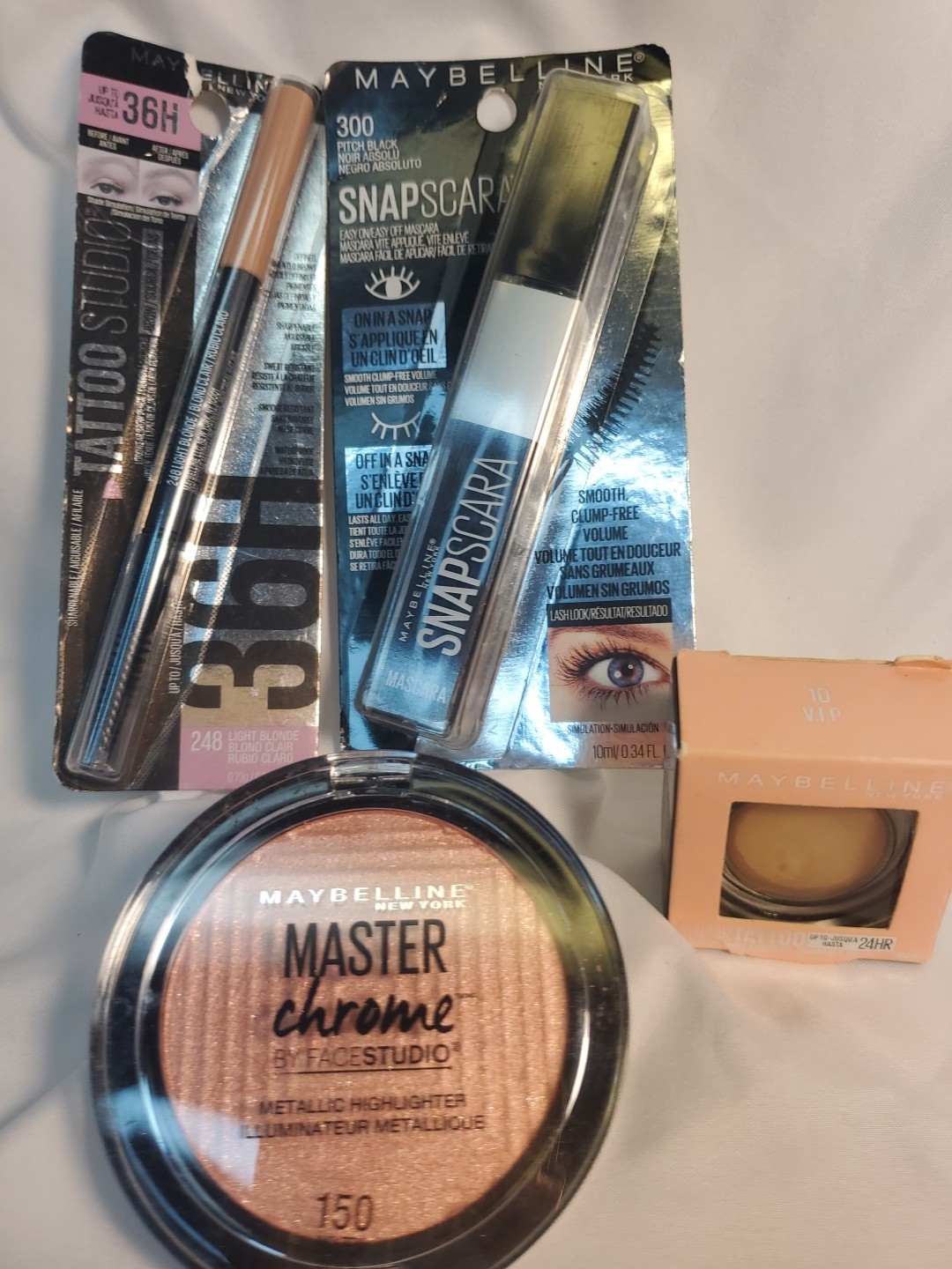 4pc. Maybelline Highlighter, Mascara,Tatoo Studio Brow Pencil, Cream Eyeshadow