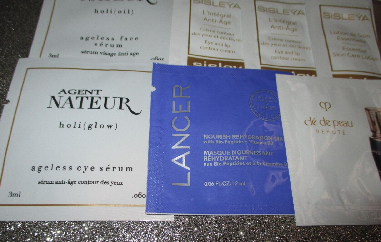 21 Pieces High End Skincare Sample Lot Sisley, Cle de Peau. Bader, Agent Nateur
