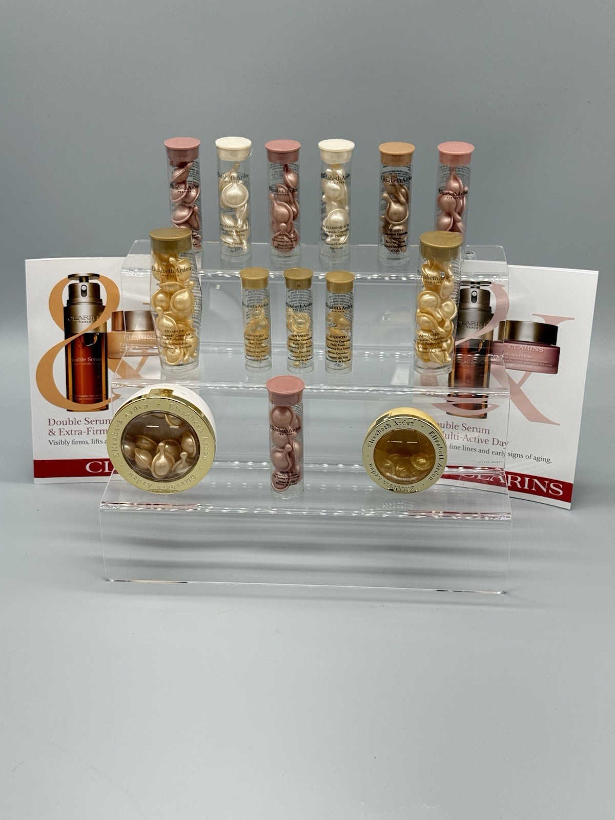 WHOLESALE LOT OF 119 CAPSULES ELIZABETH ARDEN / CLARINS PARIS BEAUTY PRODUCTS