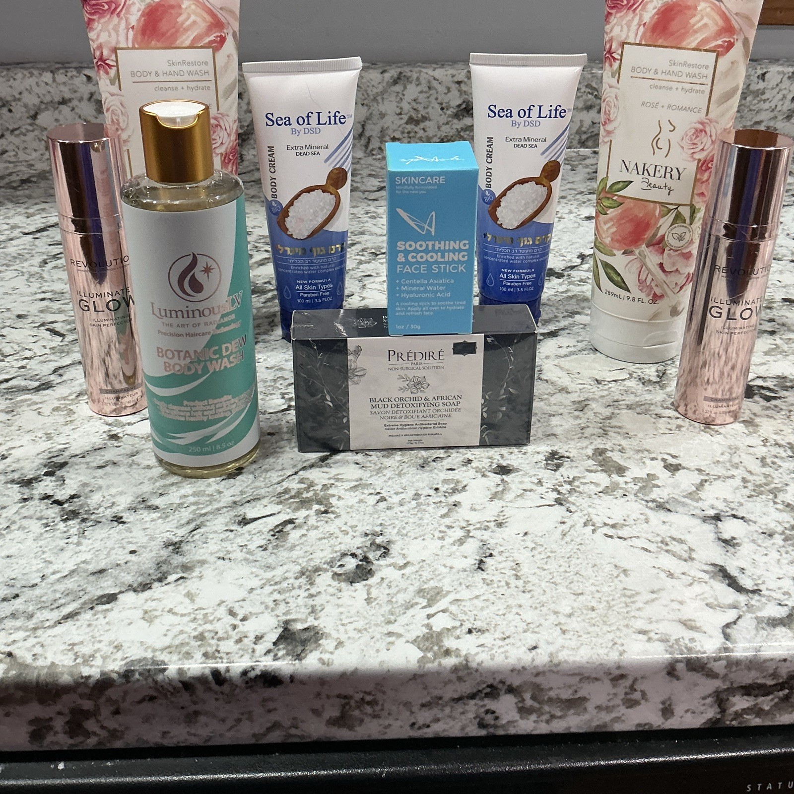 Assorted Beauty Lot: Revolution Illuminate Glow, Sea of Life Body Cream