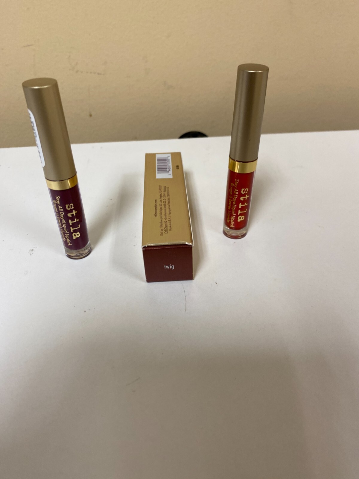 Beauty” NWOB “Stila” liquid eye shadow and 2 lip glosses. C below for info.
