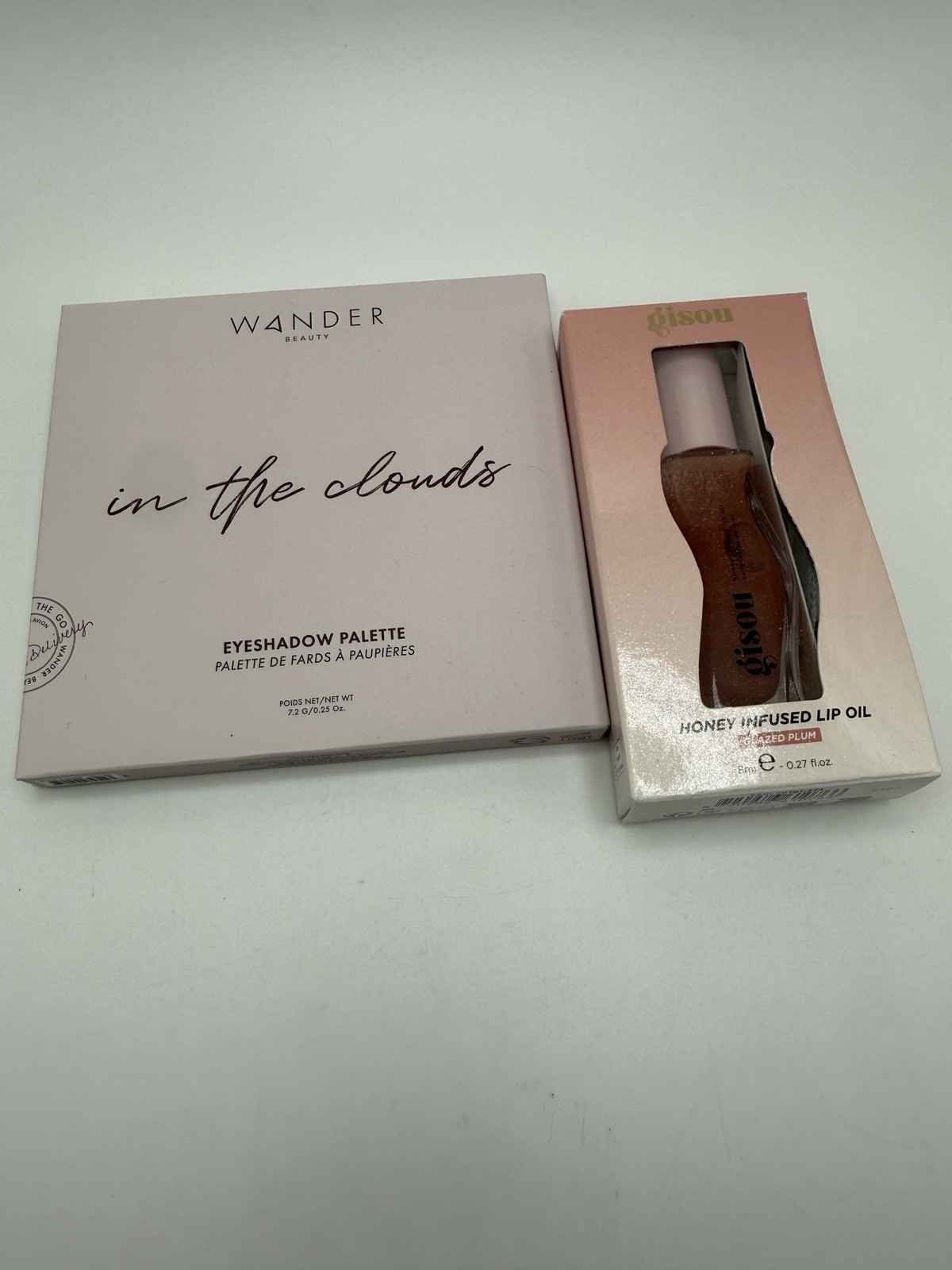 In The Clouds Wander Eyeshadow Palette Gisou Honey Infused Lip Oil GLAZED PLUM