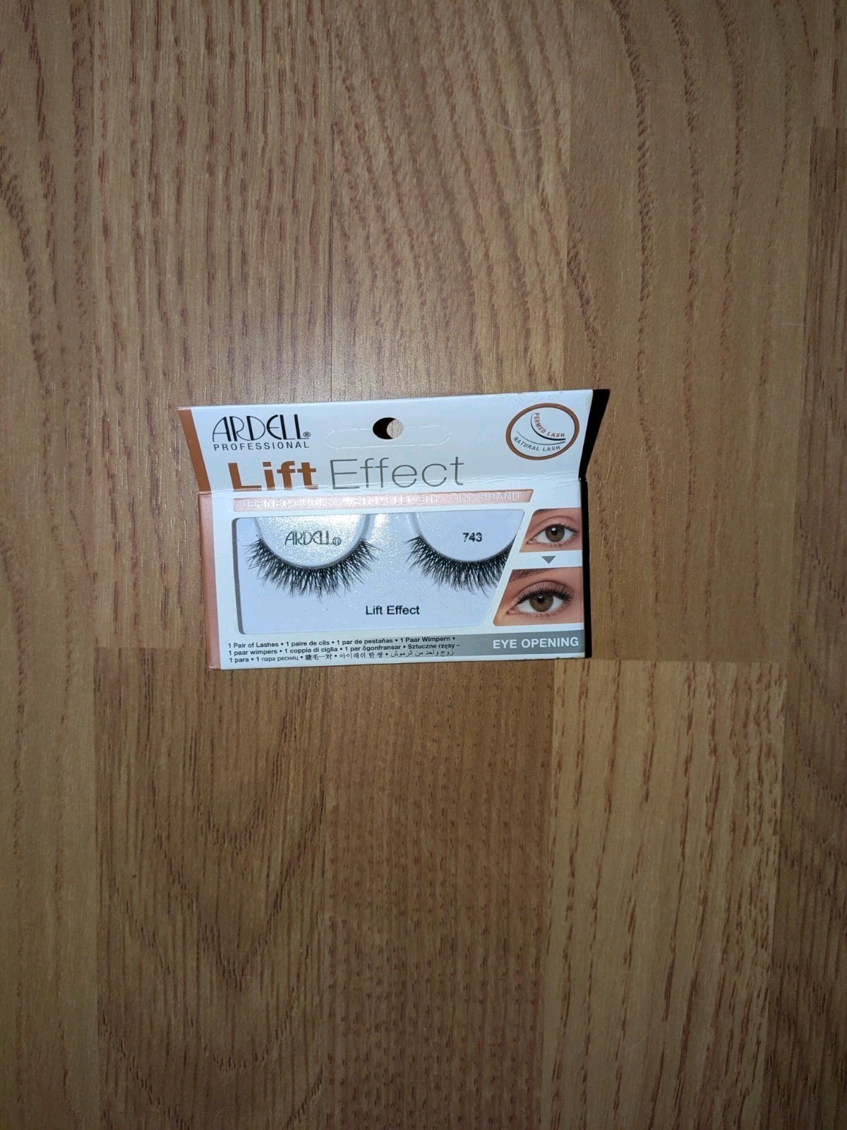 bundle of beauty items: false eyelashes, hair ties, temporary tattoos