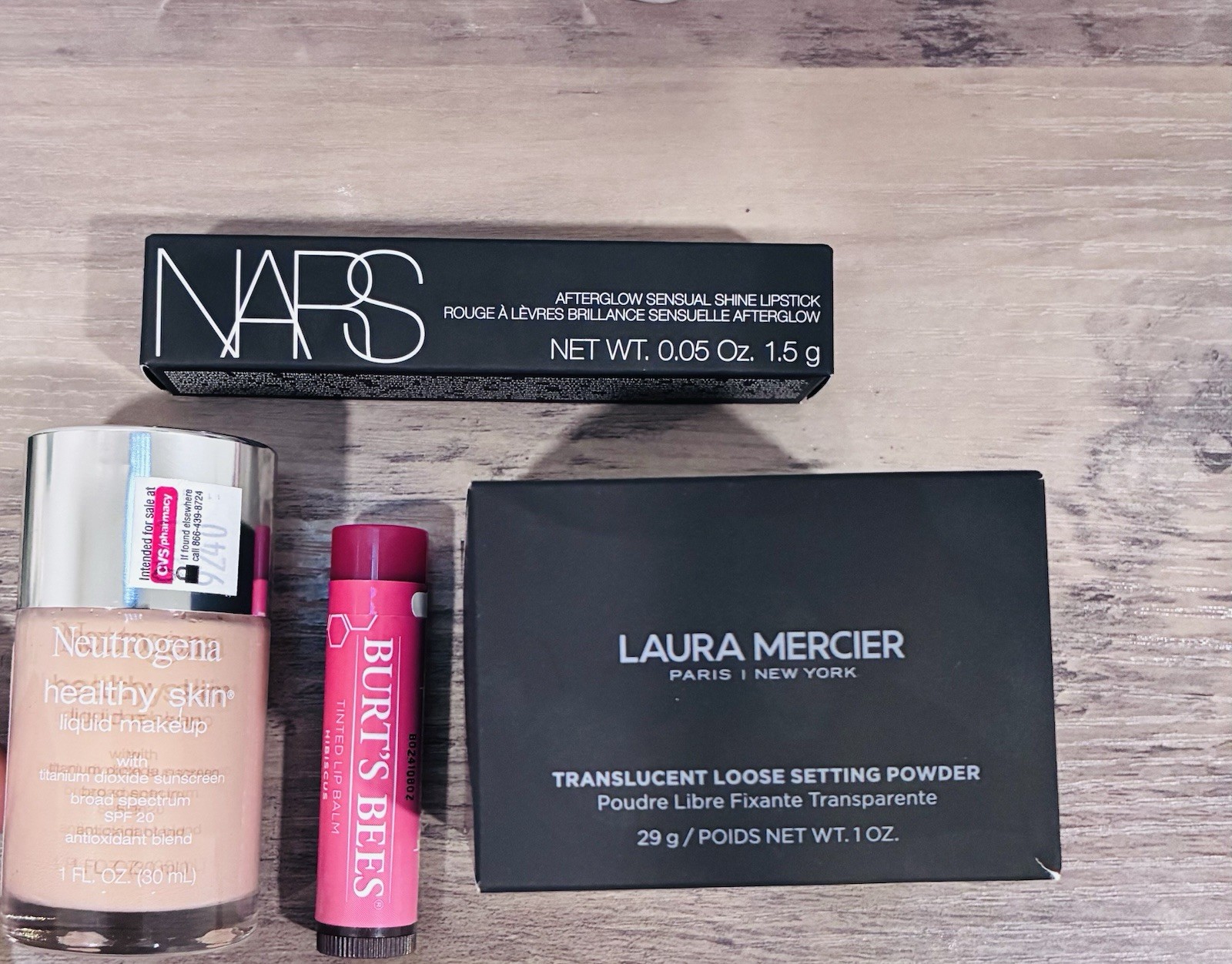 NARS Lipstick, Laura Mercier Powder, Neutrogena SPF 20 Foundation, Burt’s Bees …