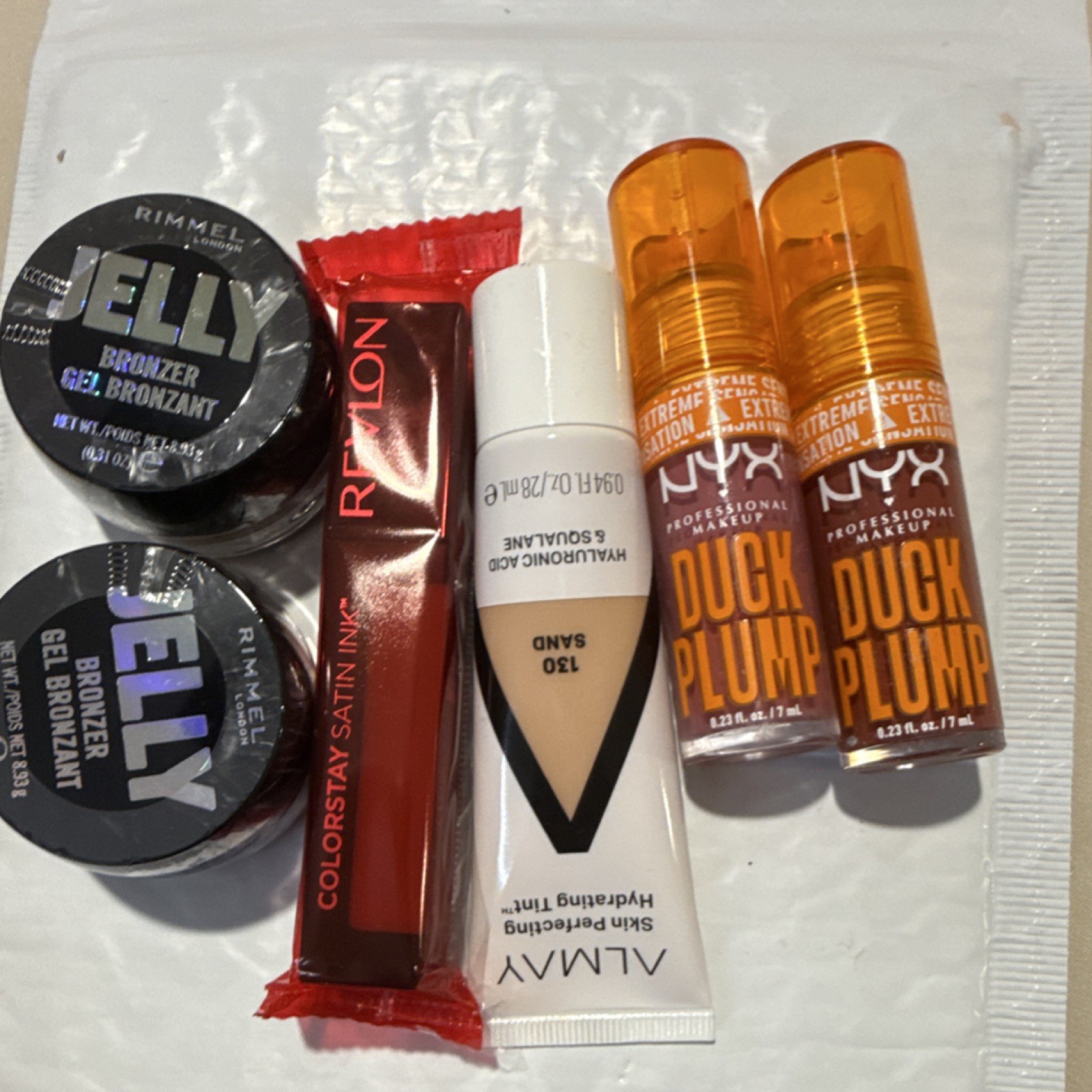 Rimmel Jelly Bronzer 002, Revlon Satin Ink, Almay Tint 130, NYX Duck Plump, Ful…
