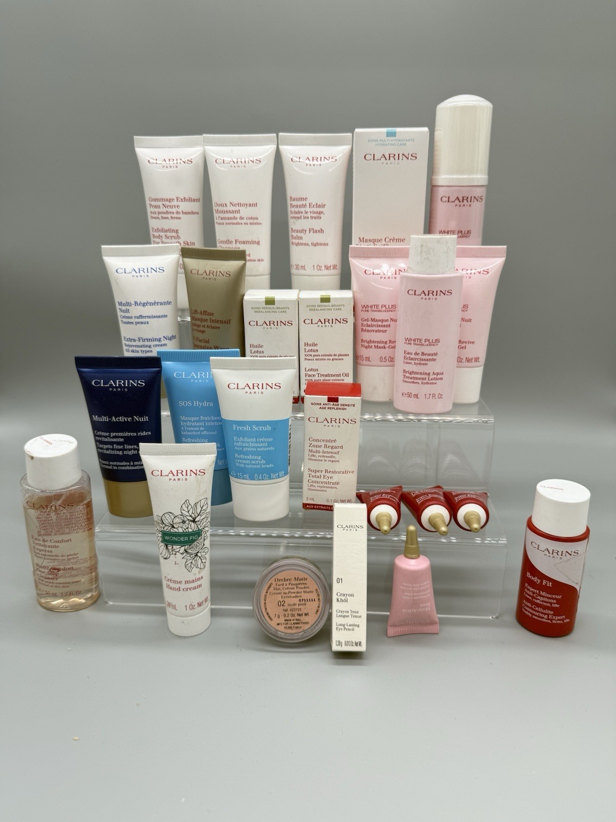 WHOLESALE LOT OF 55 MIXED/ASSORTED CLARINS PARIS BEAUTY PRODUCTS