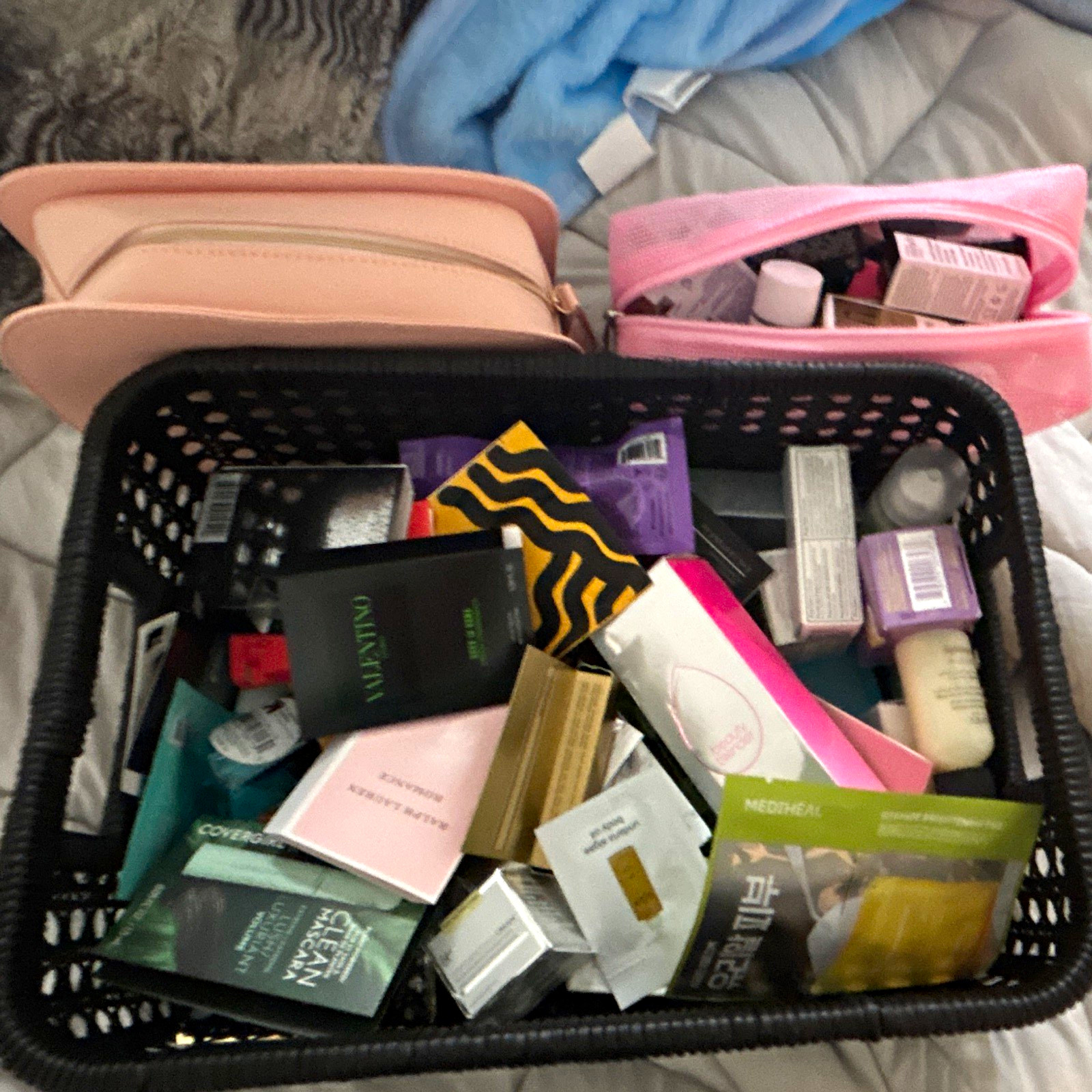 Assorted Travel/Sample Beauty Lot: from Ulta. Two make up bags included. Box not