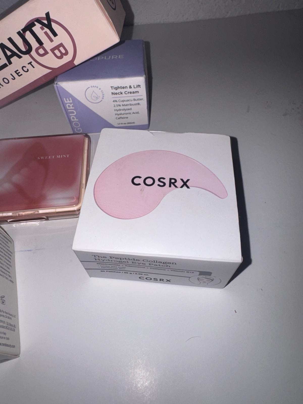 Assorted Full Size Mixed Lot: Rare Beauty Highlighter, COSRX Eye Patch, omre