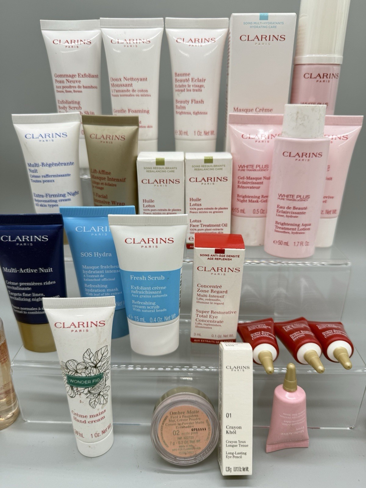 WHOLESALE LOT OF 55 MIXED/ASSORTED CLARINS PARIS BEAUTY PRODUCTS