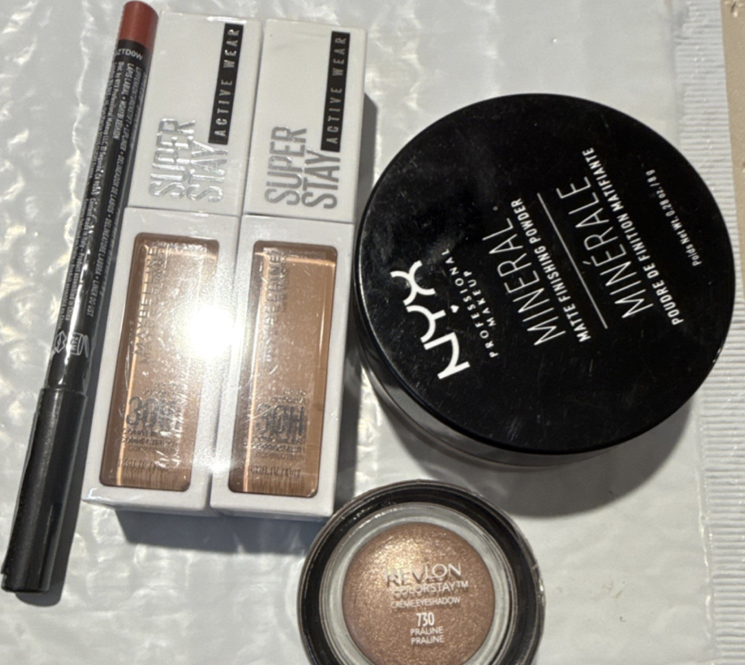 Maybelline Super Stay Concealer, NYX Mineral Powder, Revlon ColorStay Eyeshadow
