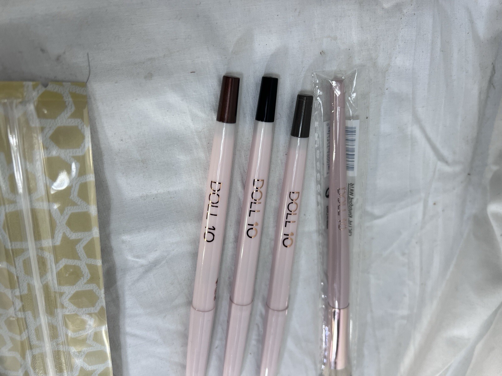 Lot Of Doll 10 Makeup: Brow Pencil , Overarchiever, Anti Stress Cream, Eyeliner