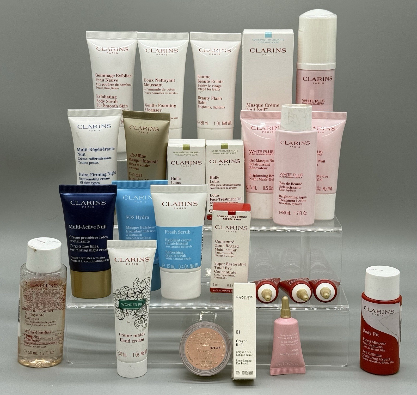 WHOLESALE LOT OF 55 MIXED/ASSORTED CLARINS PARIS BEAUTY PRODUCTS