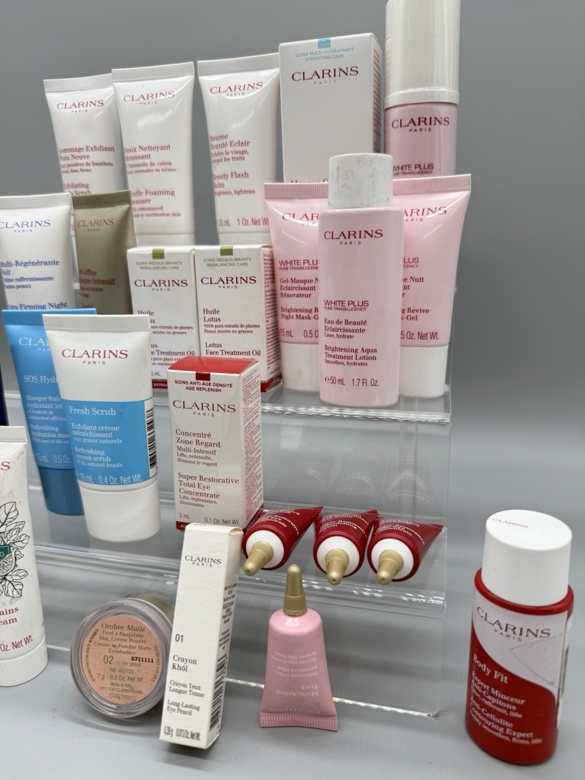 WHOLESALE LOT OF 55 MIXED/ASSORTED CLARINS PARIS BEAUTY PRODUCTS