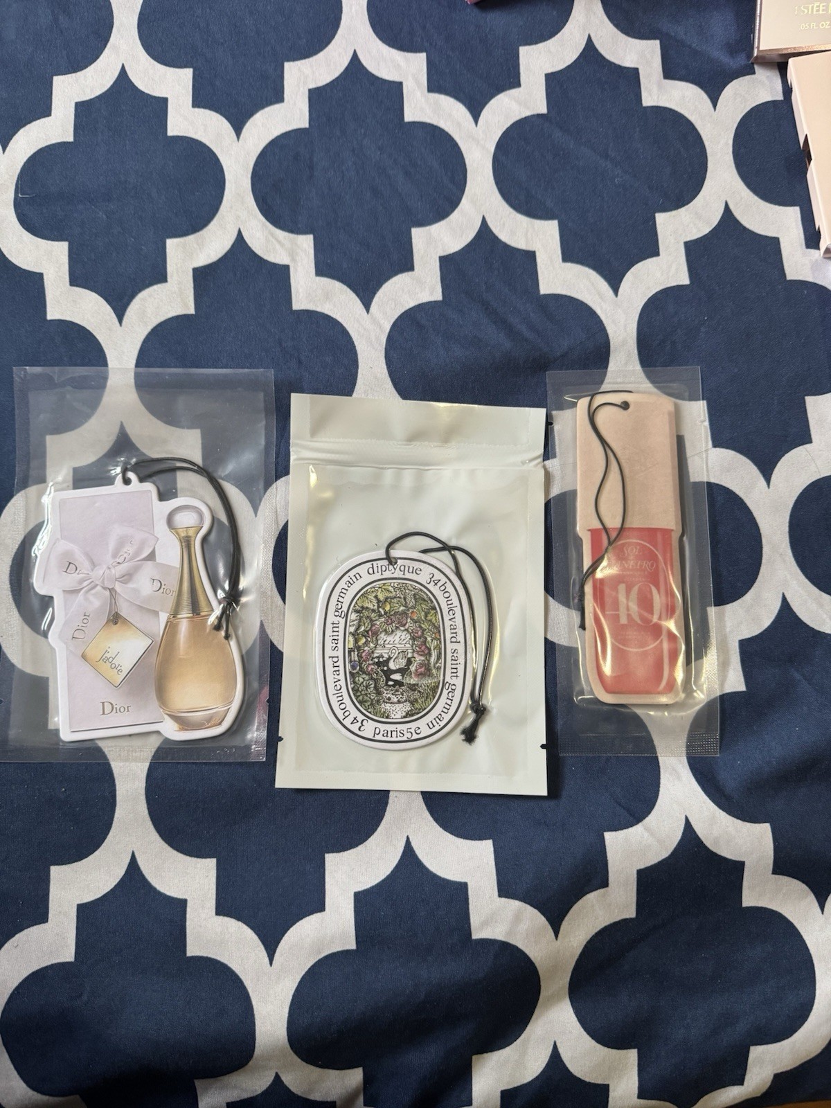 Bundle of unisex 28-29 perfume spray’s and three car freshener