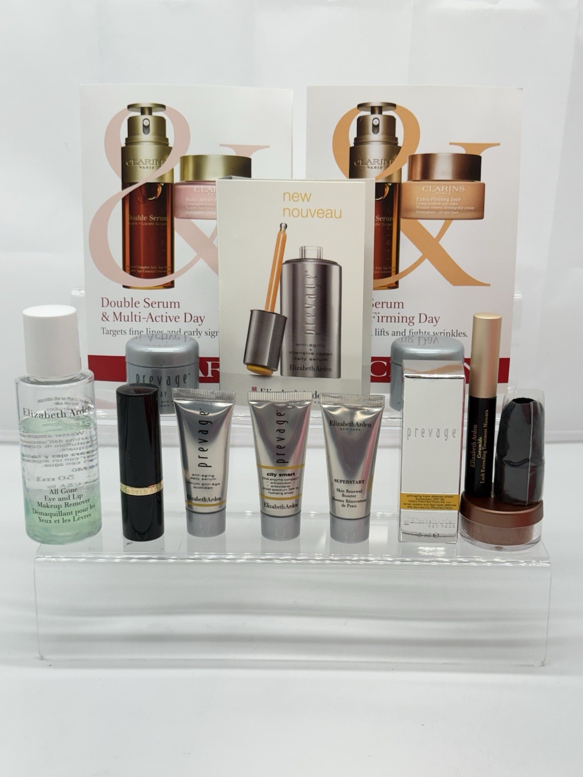 LOT OF 17 ELIZABETH ARDEN/CLARINS PARIS BEAUTY PRODUCTS + 1 TRAVEL BAG