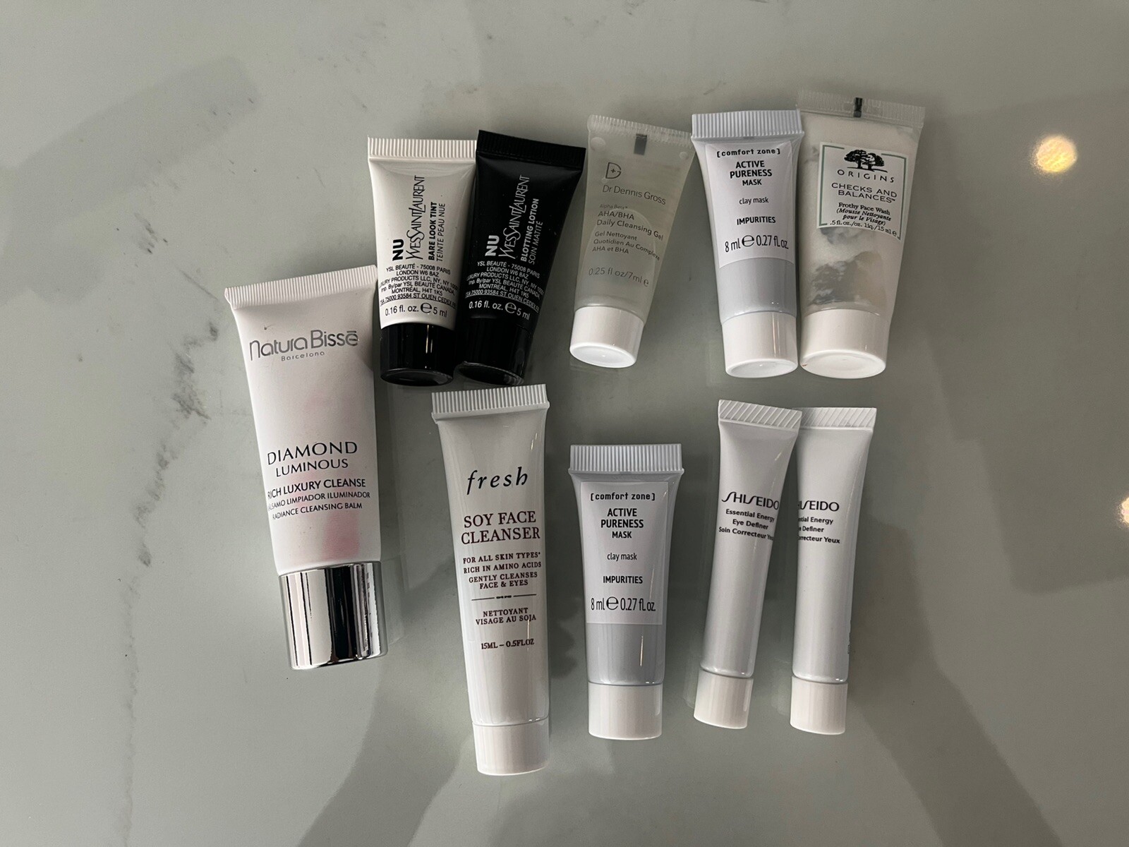 Lot of 32 Travel & Sample Beauty Products Skin/Makeup YSL/Oribe/Kiehls NEW