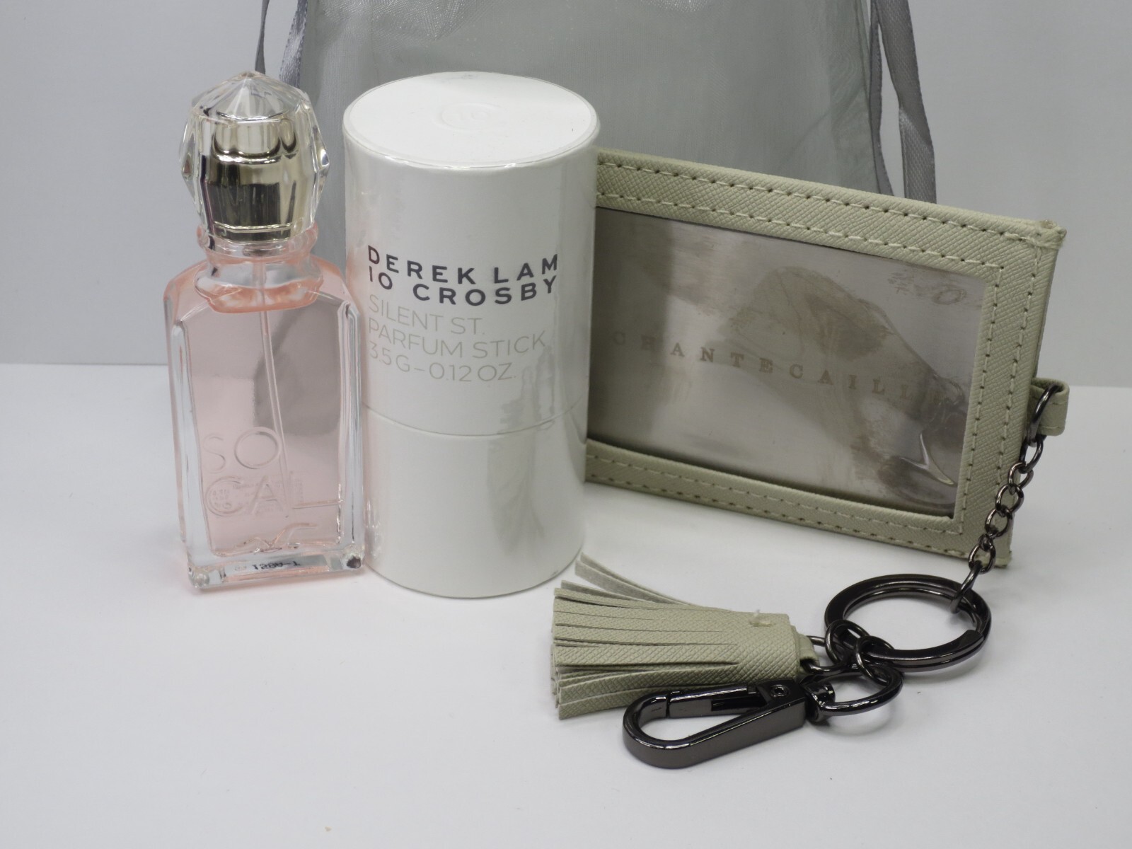 ASSORTED TRAVEL ESSENTIALS – PARFUM STICK, EAU DE PARFUM & MIRROR KEYCHAIN