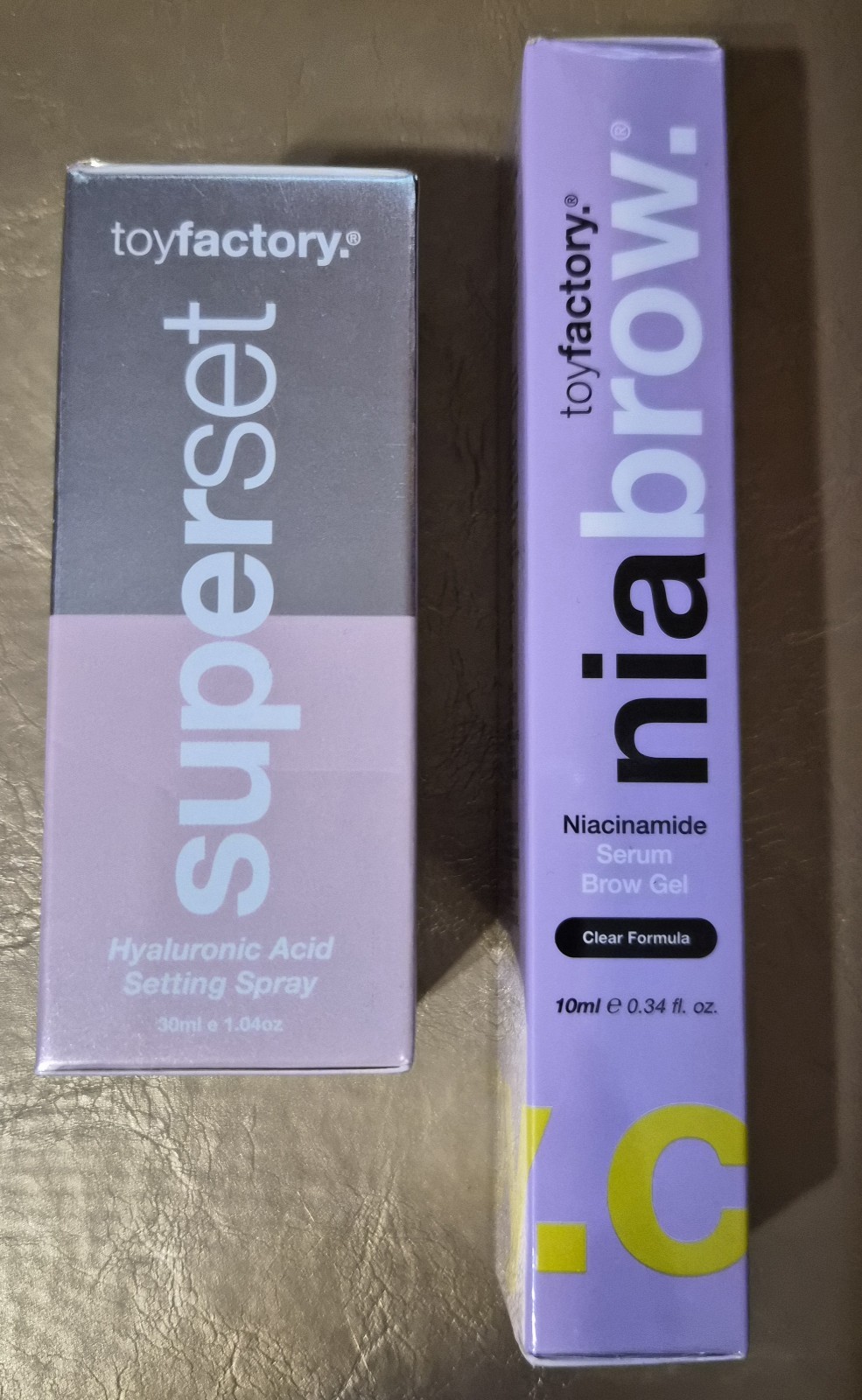 TOY FACTORY LOT OF 2 ITEMS SETTING SPRAY & BROW SERUM GEL NIB