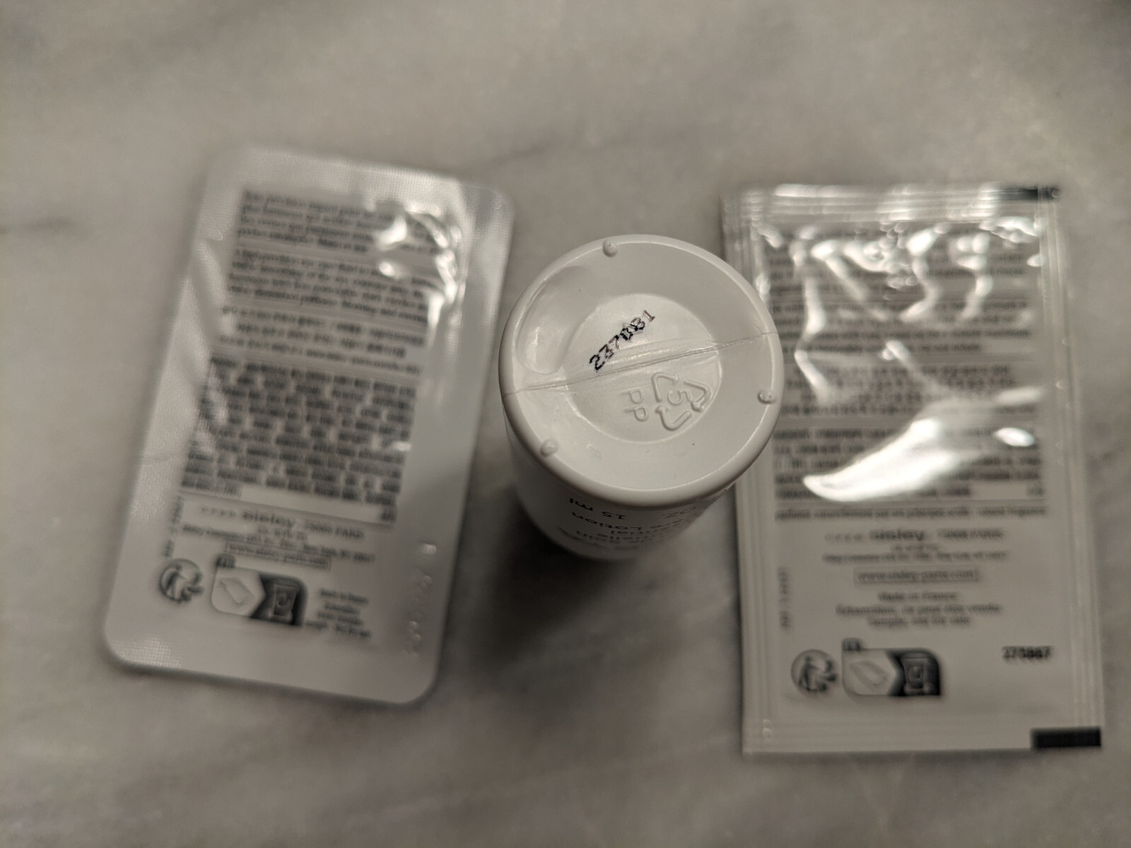 QTY 9 Sisley sample set, L’Integral Anti-age , serum & Winter 2025 make up bag